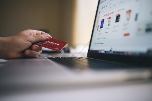 shopping on computer with credit card