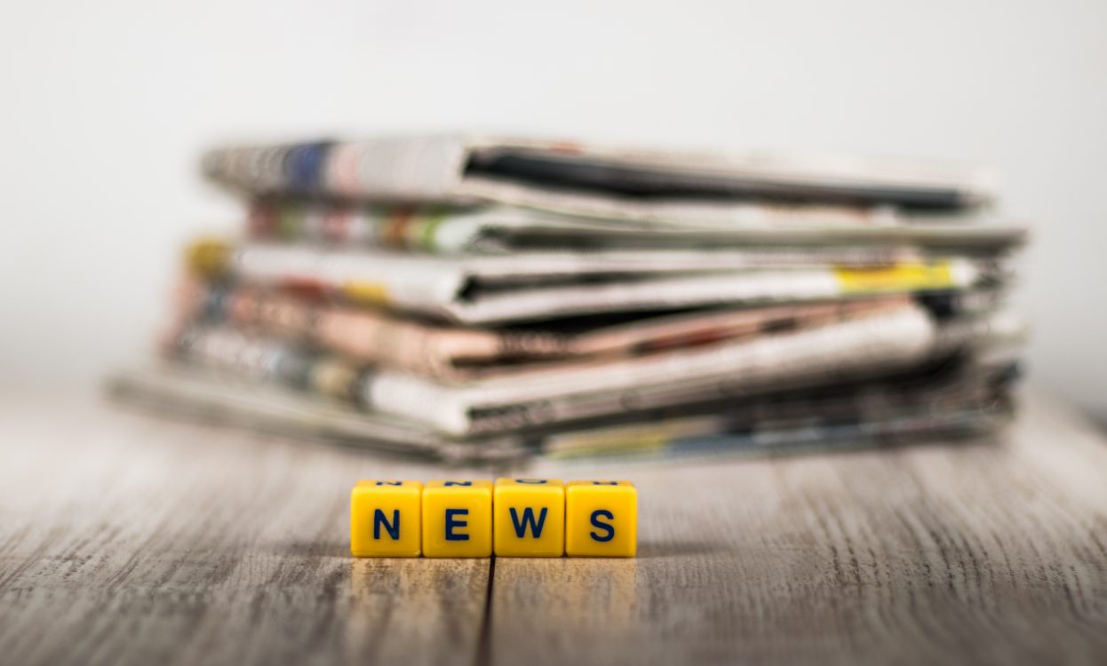 newspapers in pile 