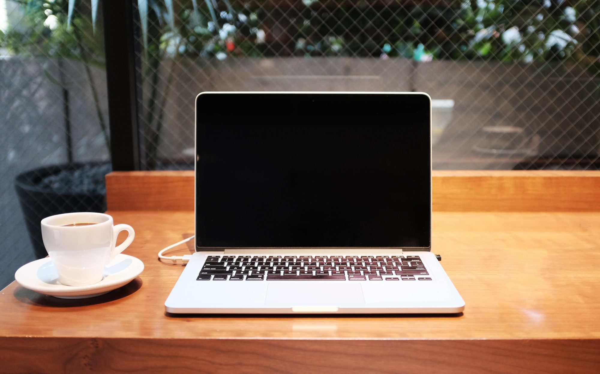 Laptop on a wooden desk