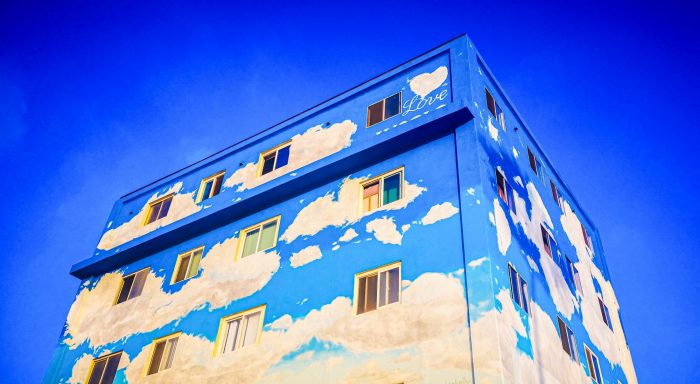 A building with painted on clouds