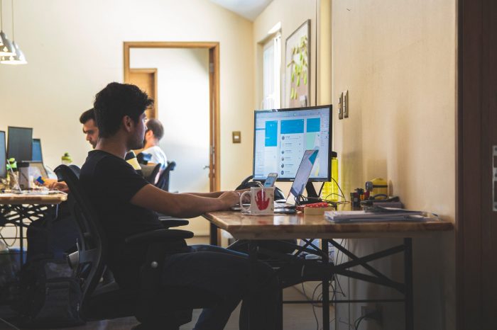 Millenial working on computer 