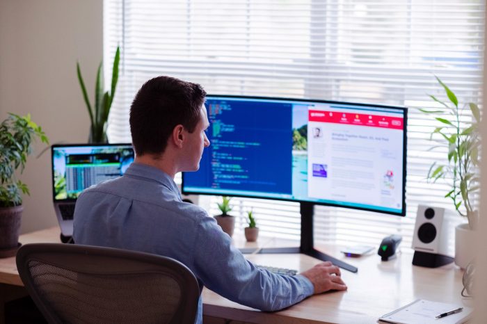 Man working at home in dress shirt