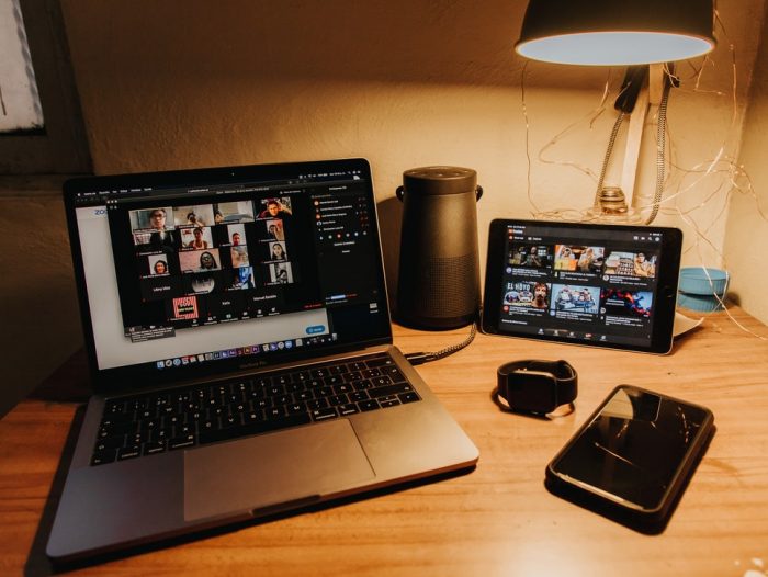 A laptop and iPad on table 