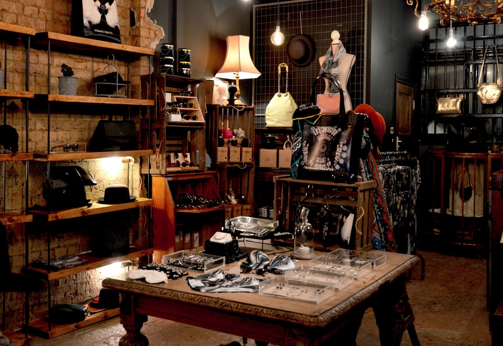 A wooden table in a retail store