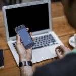 man holding a cell phone