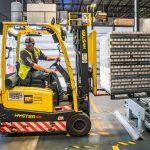 fork lift with a pallet of beer