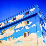 A building with painted on clouds