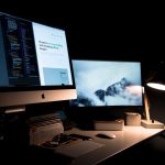 Two computers on a desk