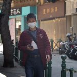 Man wearing mask in asian county