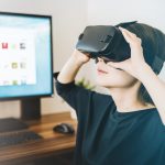 Woman wearing black virtual reality headset