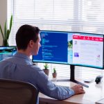 Man working at home in dress shirt